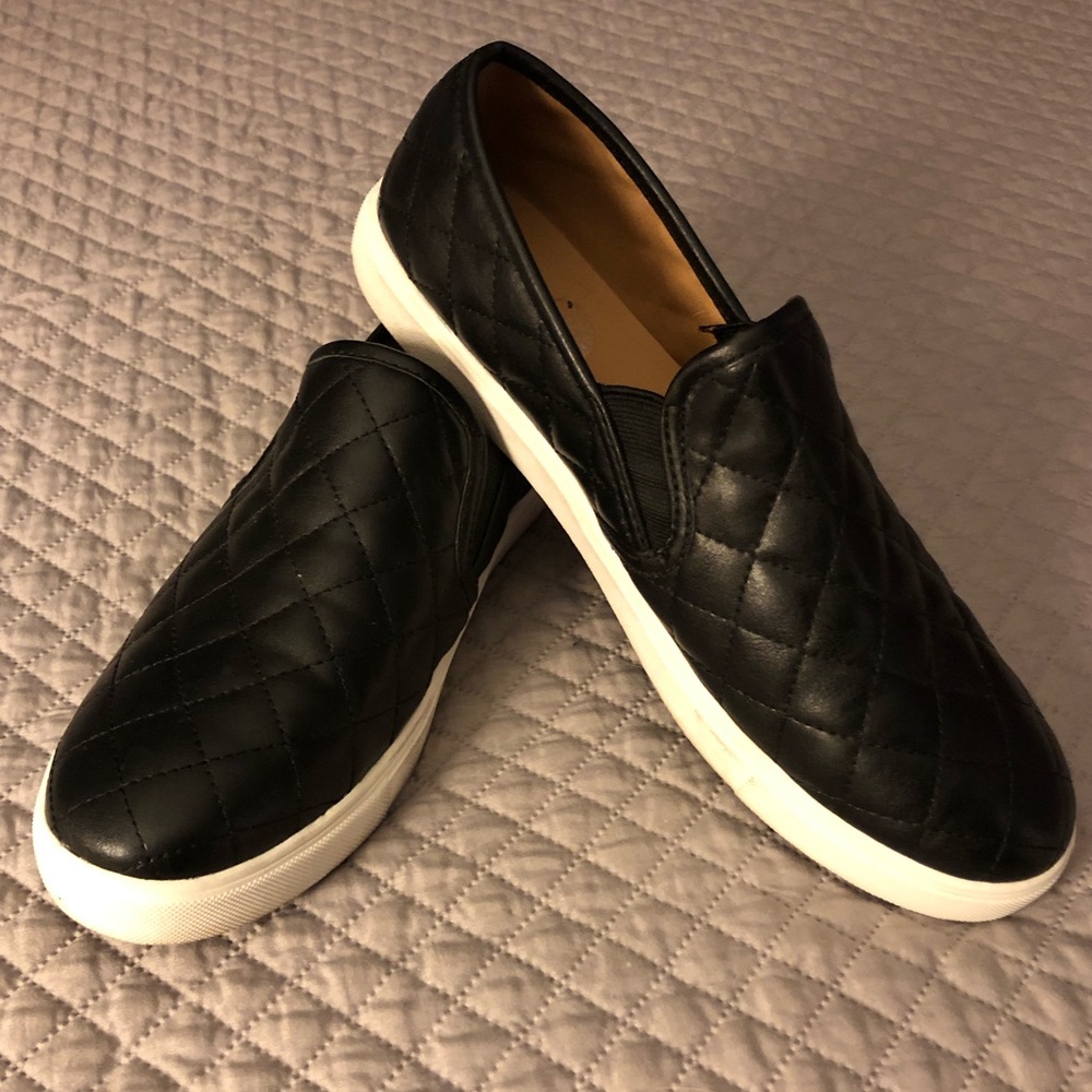 Quilted black slip on shoes